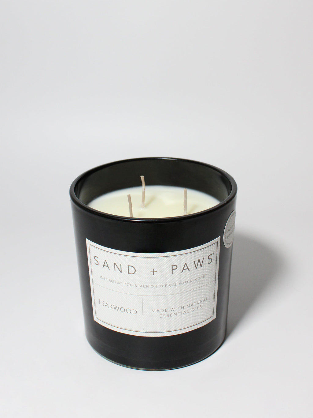Aromatic Sand + Paws Teakwood 21 oz scented candle